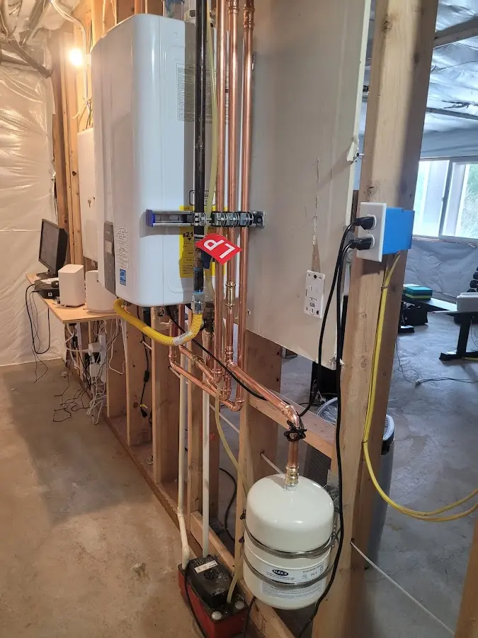 Licensed plumber repairing a kitchen sink in Miles City